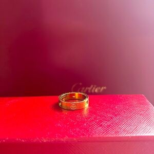Size 54 yellow gold Cartier LOVE ring, missing diamonds